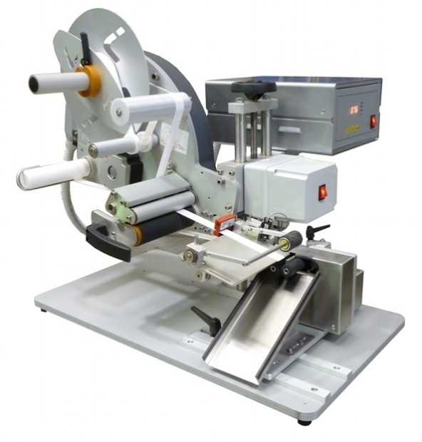 Etichettatrice semi-automatica per applicazione su fiale, flaconcini e prodotti cindrici di piccole dimensioni