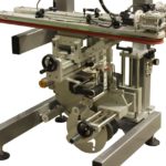 Sistema di etichettatura sul lato inferiore di falconi per profumeria