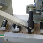 Etichettatrice per applicazione etichetta sigillo di garanzia